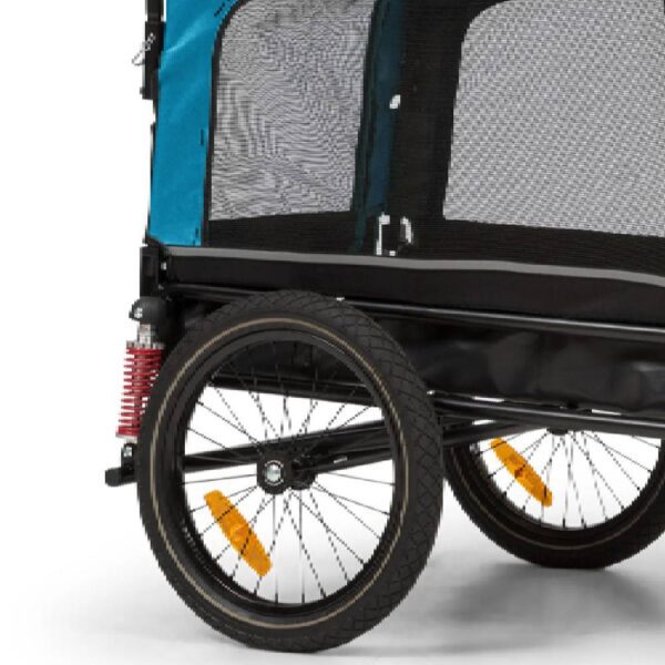 remorque vélo chien amortisseur vu rues arrières