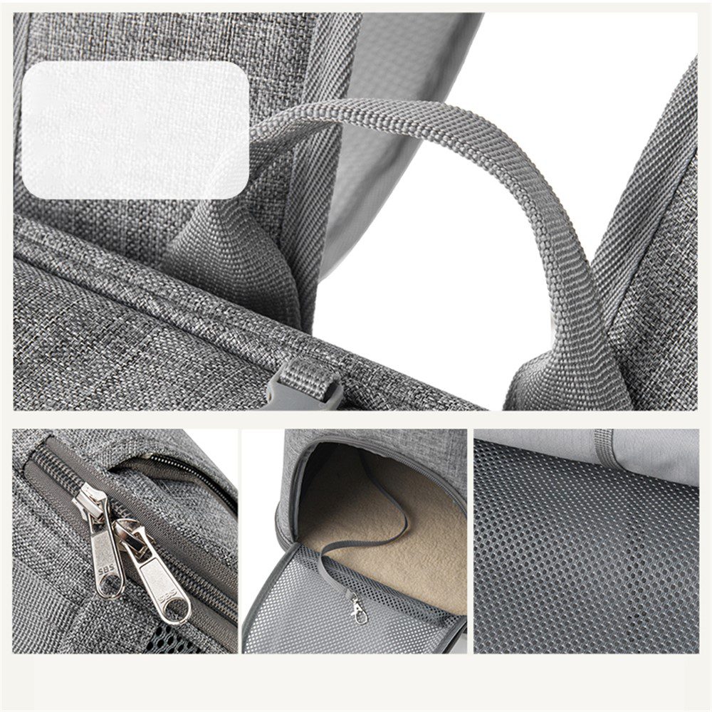 Détails du sac gris : anse de portage, bande auto-agrippante, double curseur de fermeture éclair et doublure en maille