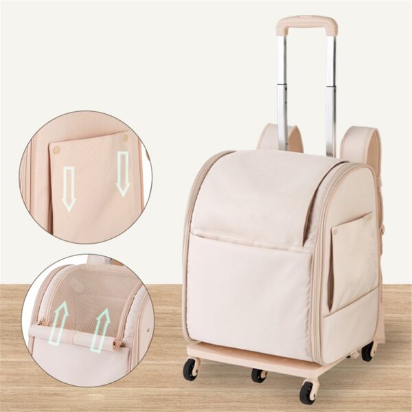 Sac à roulettes beige rosé, poignée télescopique et deux agrandissements de poches coulissantes à flèches