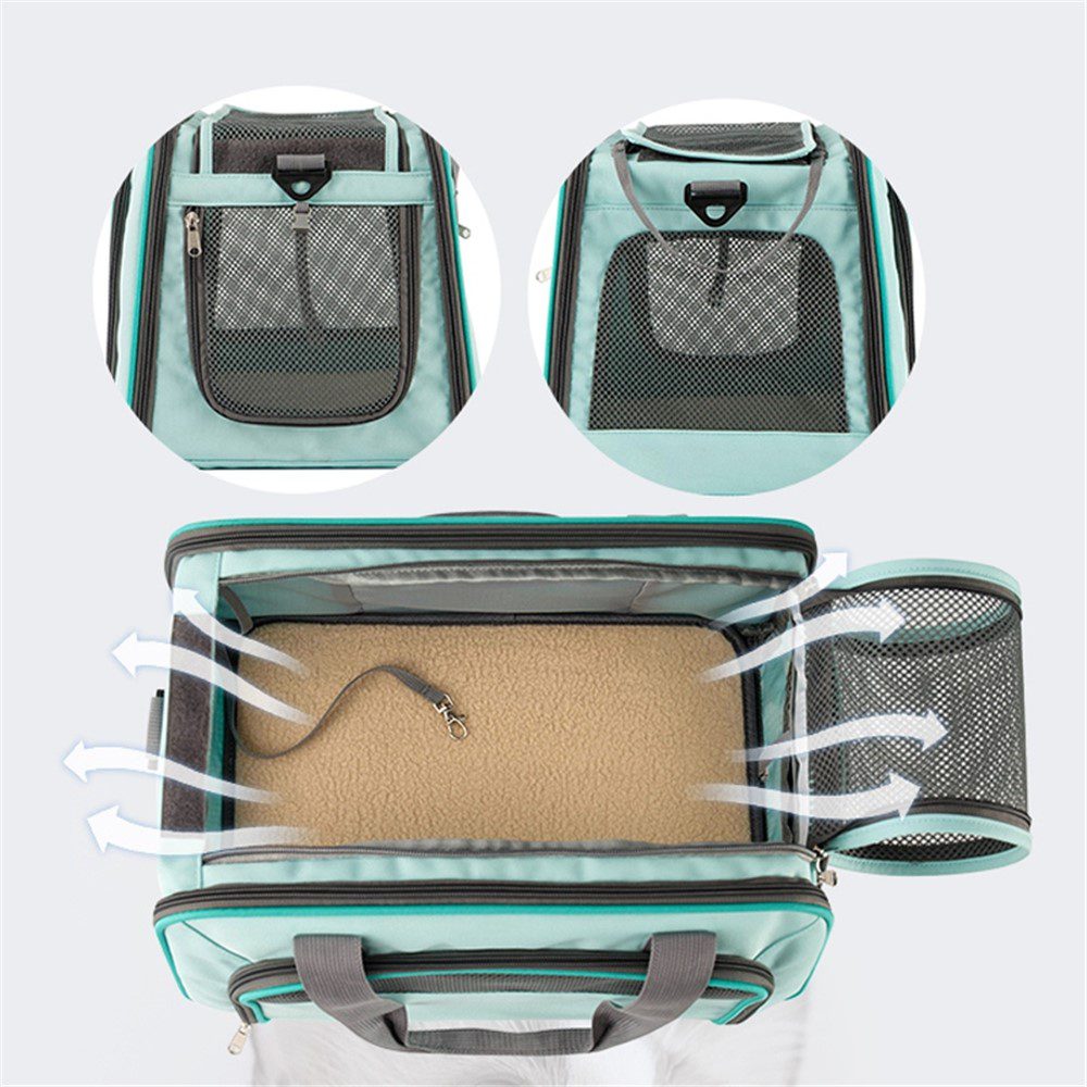 Vue du dessus du sac turquoise ouvert avec flèches d'aération, tapis et extension latérale en filet, deux fenêtres en haut