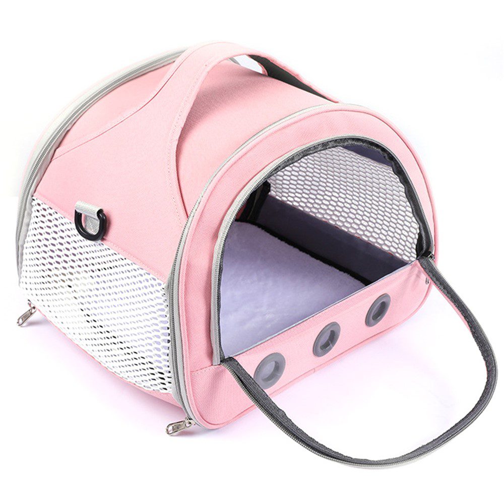Sac de transport rose entrouvert, intérieur doublé gris-violet, anse grise rabattue et aérations rondes