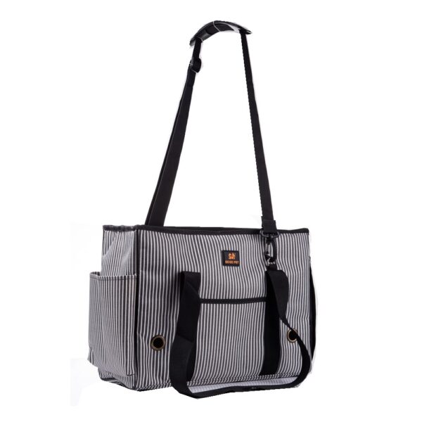 Sac rayé à fine bandoulière noire fixée par mousqueton, anses courtes repliées et poche de côté, vue en biais