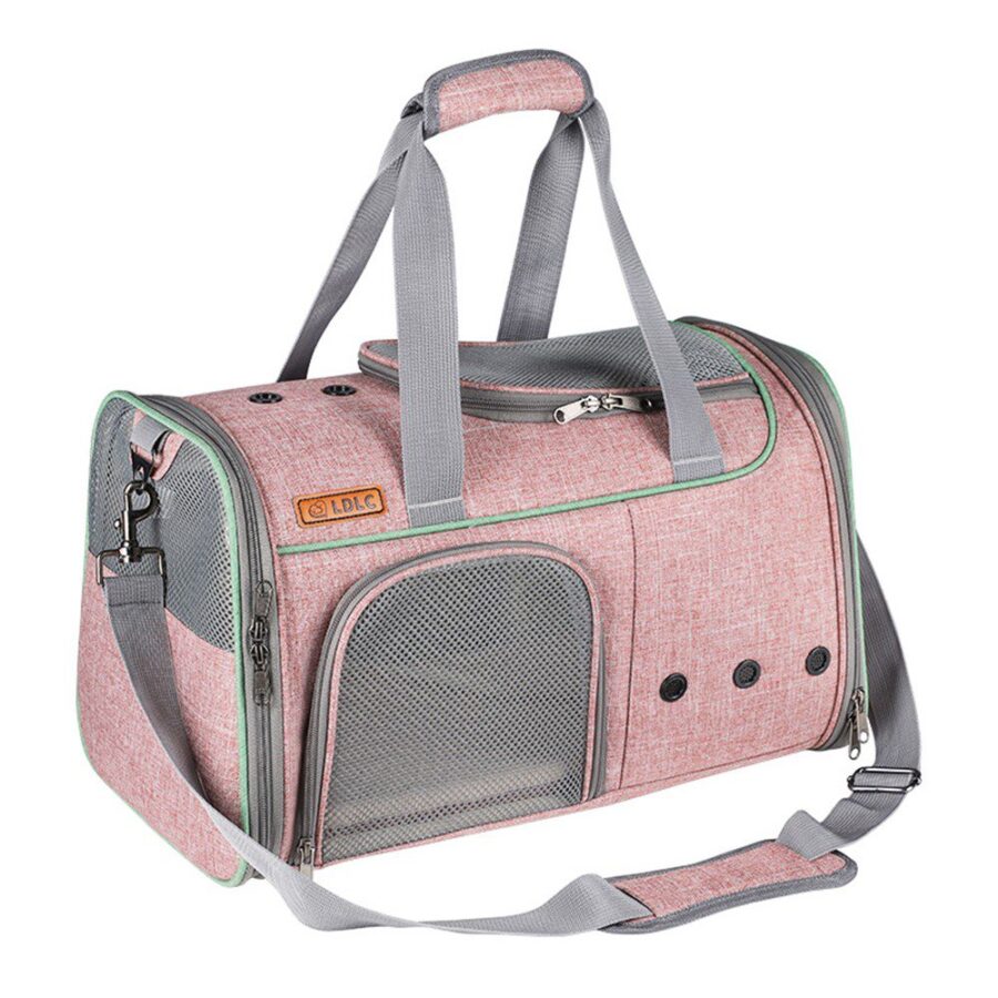 Sac rose à anses grises et longue bandoulière, grande fenêtre latérale en filet, vu de côté, trois œillets d'aération