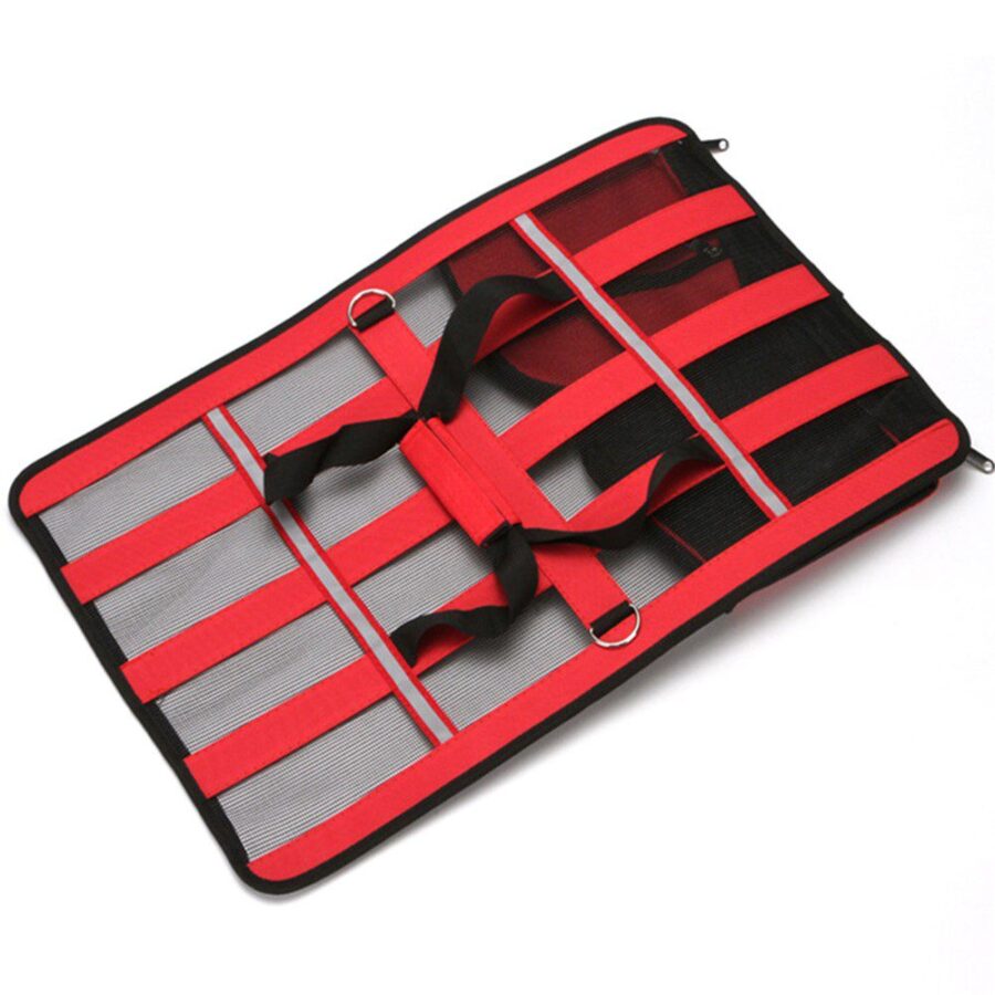 Sac de transport ouvert à plat, structure en bandes rouges sur filet aéré, fermeture éclair noire sur le pourtour