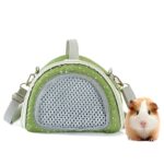 Petit sac demi-rond vert à pois blancs, face en filet gris, anses et bandoulière, avec un cochon d'Inde à côté